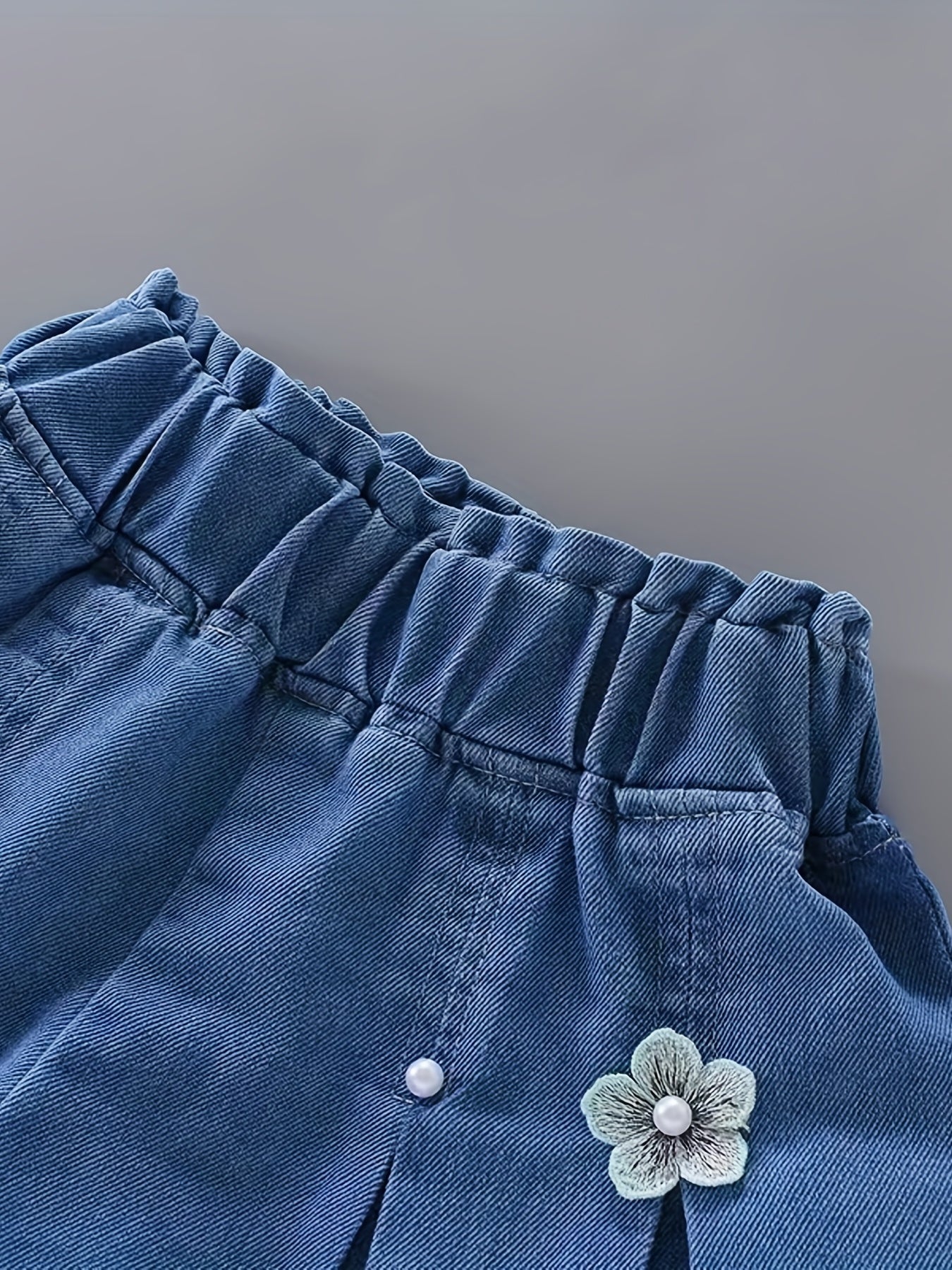 Girls' denim pleated skirt and ruffled shorts for summer, perfect for daily wear or beach holidays with a comfortable and elastic waist.