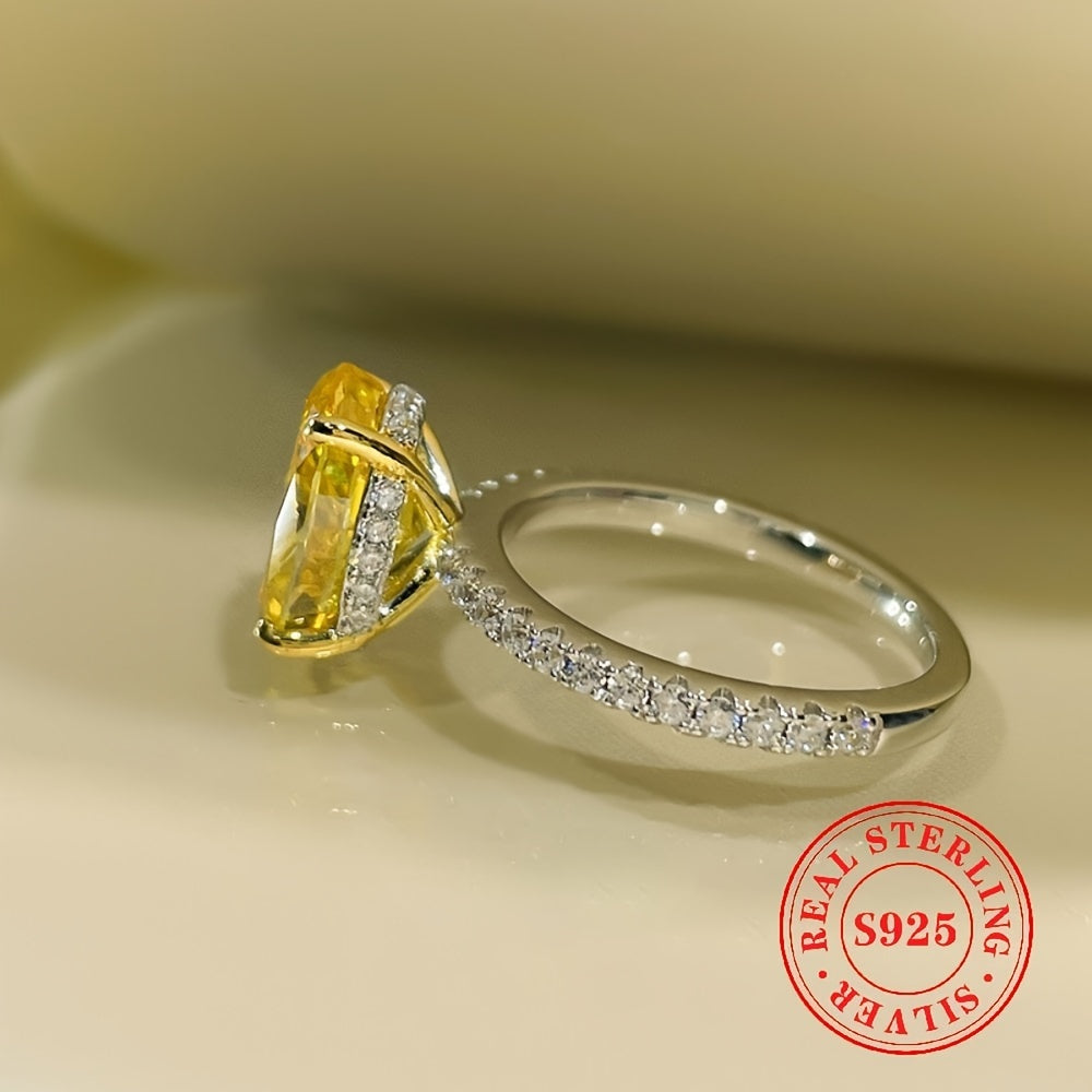 Sleek and stylish S925 sterling silver ring featuring a stunning large yellow oval-cut cubic zirconia stone. This AAA grade zirconia engagement ring is perfect for women and is gift-ready for special occasions such as banquets and Thanksgiving. Versatile