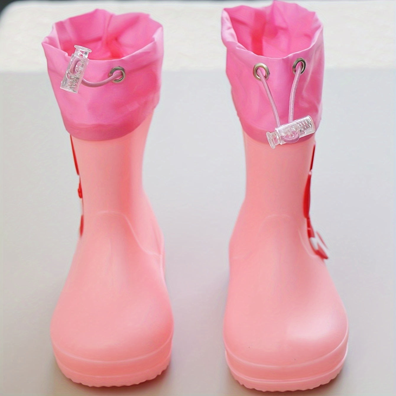 Children's cartoon rain boots, PVC water shoes, long boot style, for boys and girls ages 14 and under, suitable for outdoor school use.