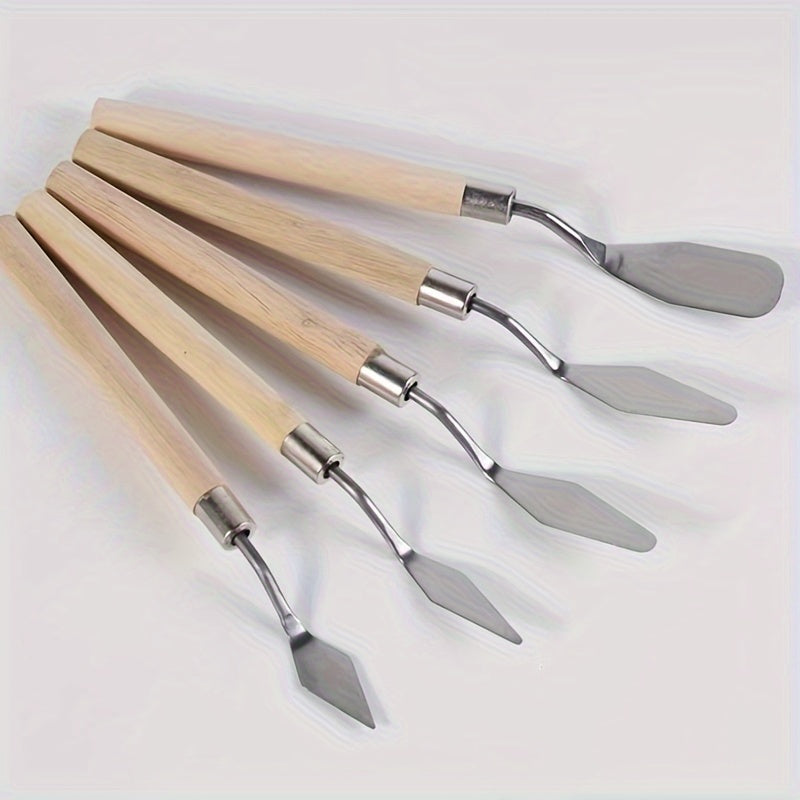 Set of stainless steel palette knives for oil painting, available in various sizes and shapes.