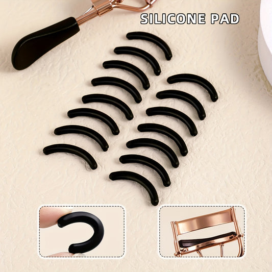 Portable eyelash curler with stainless steel handle, 15 silicone pads for curling and shaping without damaging lashes. Ideal for lifting and creating big, beautiful eyes on women.