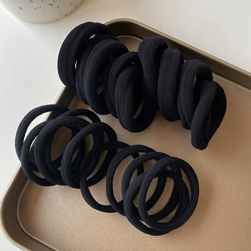 Solid color elastic hair rings in various quantities with anti-slip feature, suitable for daily use and holiday gifts.