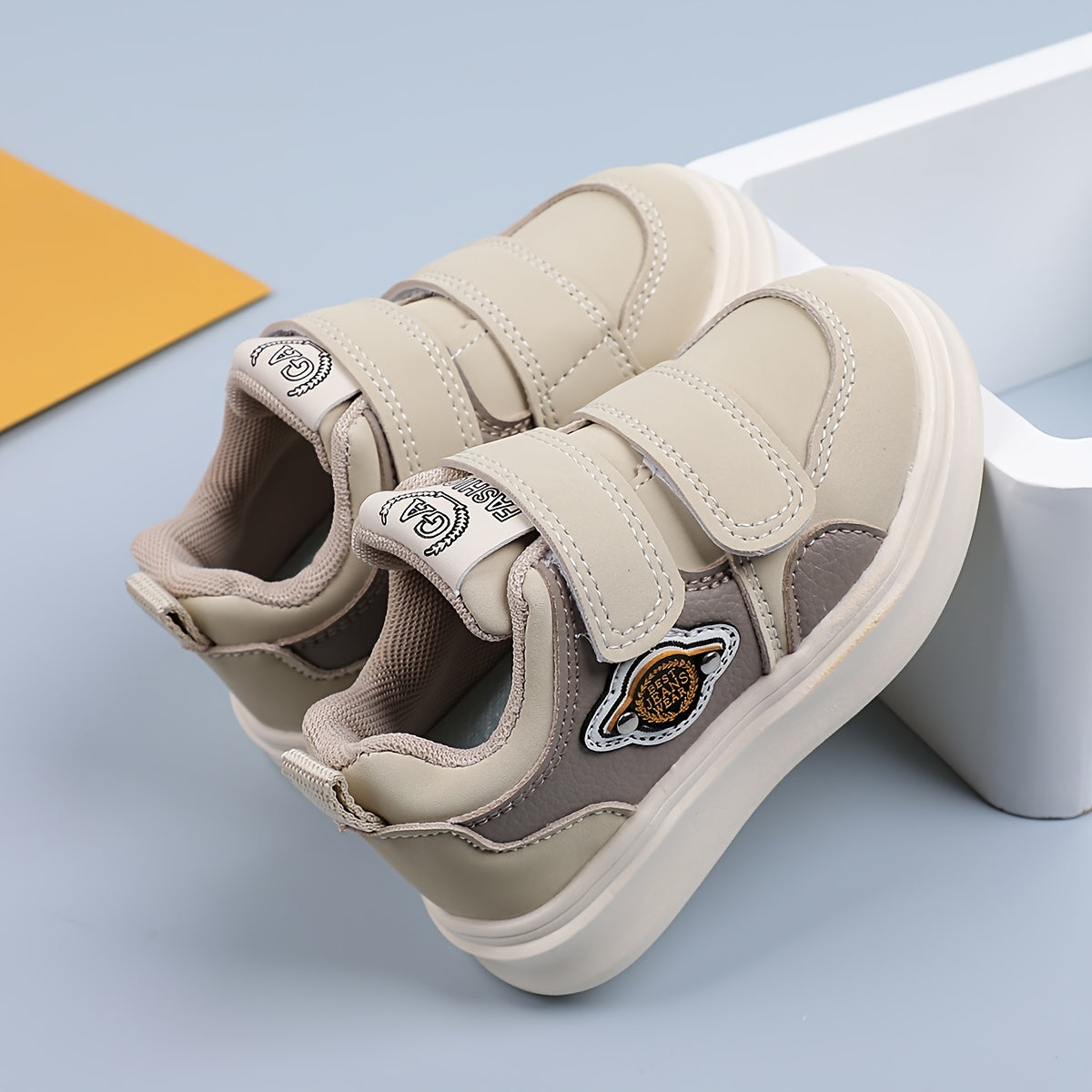 Retro casual sneakers for kids with hook-and-loop closure, breathable PU upper, and rubber sole for comfortable walking.