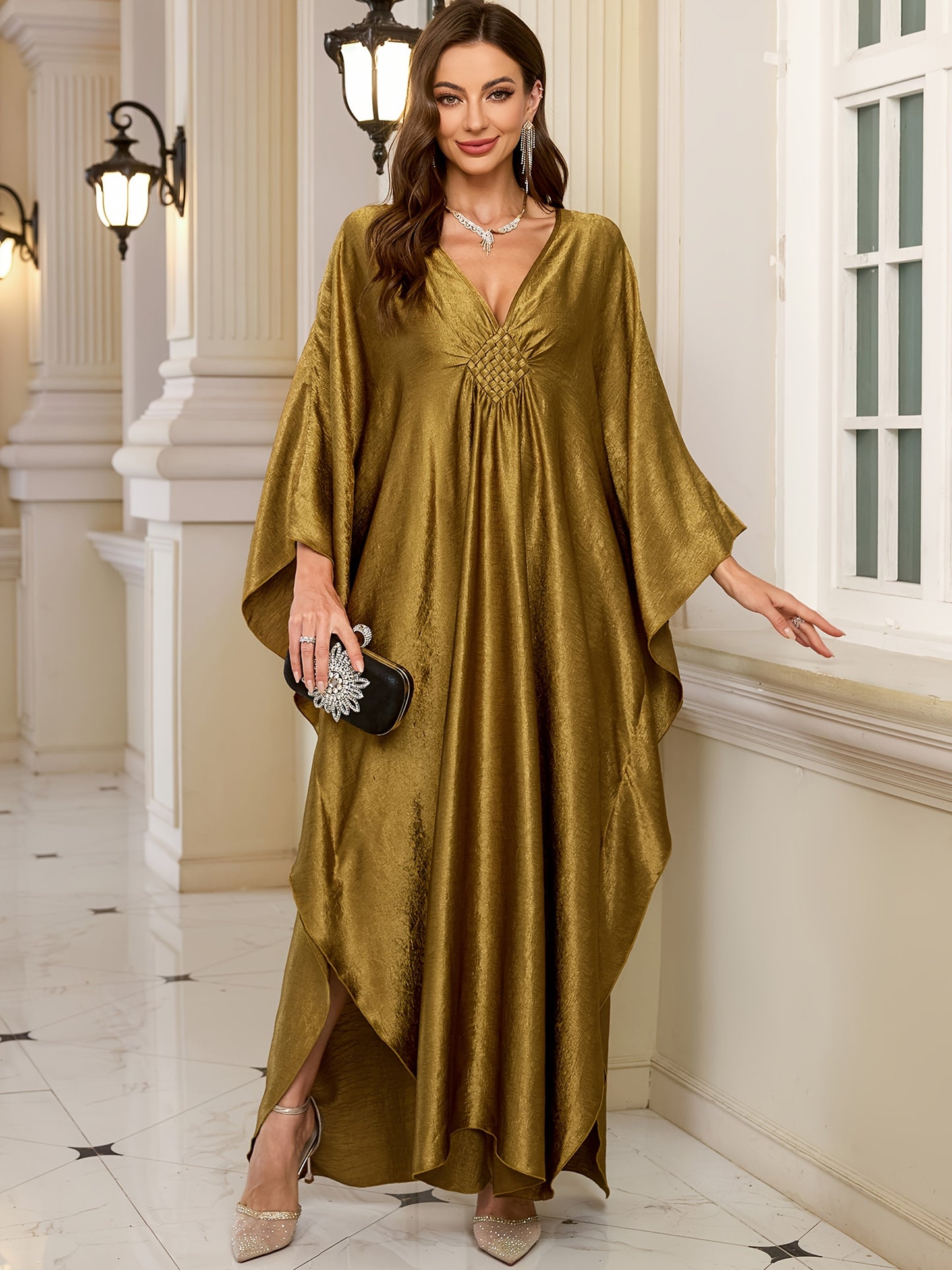 Stylish olive green V-neck kaftan dress with bat sleeves. Ideal as a beach cover-up or casual outerwear for women. Offers sun protection and a loose fit, perfect for spring/summer/fall