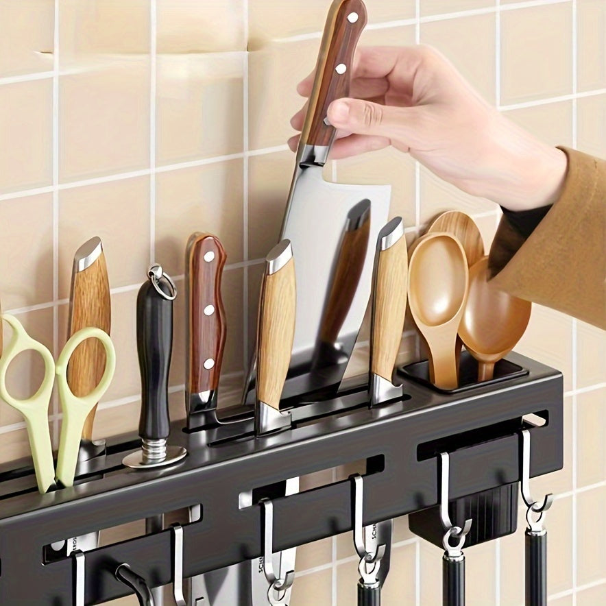 One piece of high-quality carbon steel knife rack designed for modern home kitchen storage. This rack is no-drill wall-mounted and features a multi-functional design with hooks, a towel rod, and a draining utensil caddy.