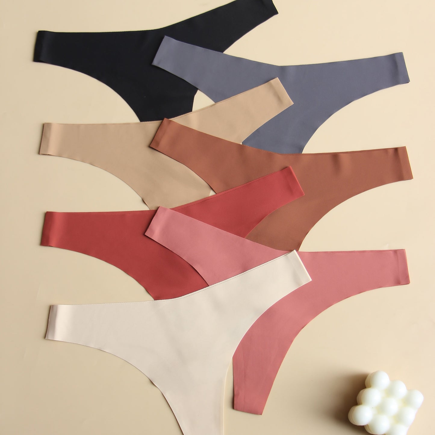 Innovative, comfortable 7-piece plain v-style women's underwear set with breathable, soft fabric and no visible marks.