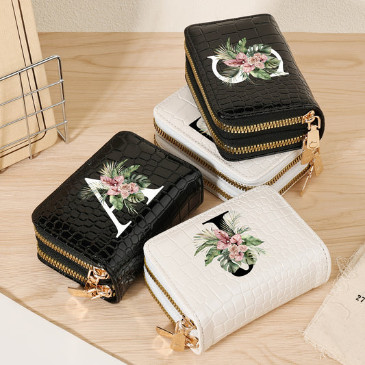 Women's credit card wallet with elegant floral letter print in black & white. Features large capacity, dual zipper, crocodile texture PU, lightweight design with nylon lining for everyday