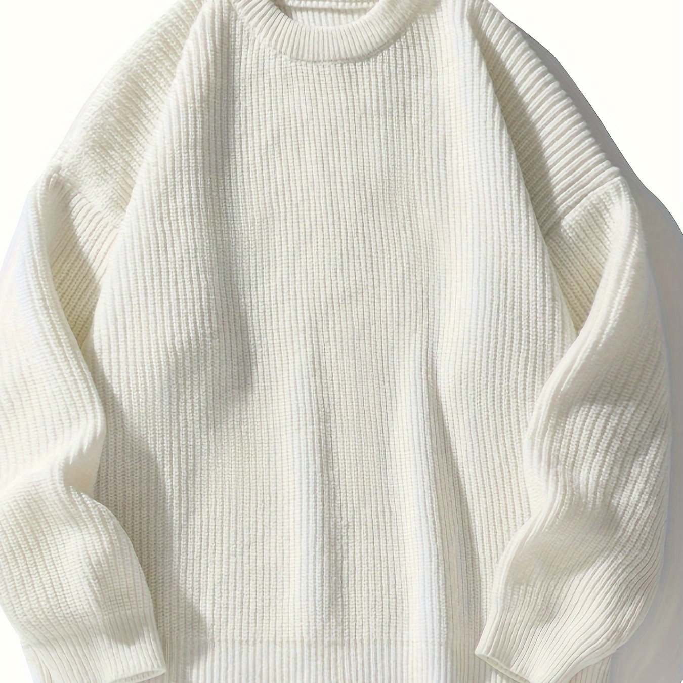 Casual men's sweater with loose fit ribbed knit and round neck for fall/winter wear.