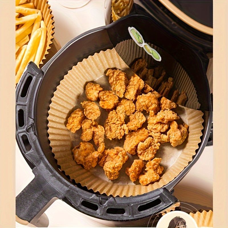 Air fryer parchment paper liners that are non-stick, come in packs of 100 or 50, and measure 16.0 cm each.