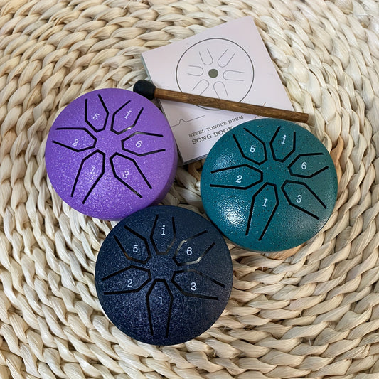 Compact steel tongue drum with 6 notes, perfect for beginners and music lovers. Ideal for camping, meditation, or yoga with clear, relaxing sound.