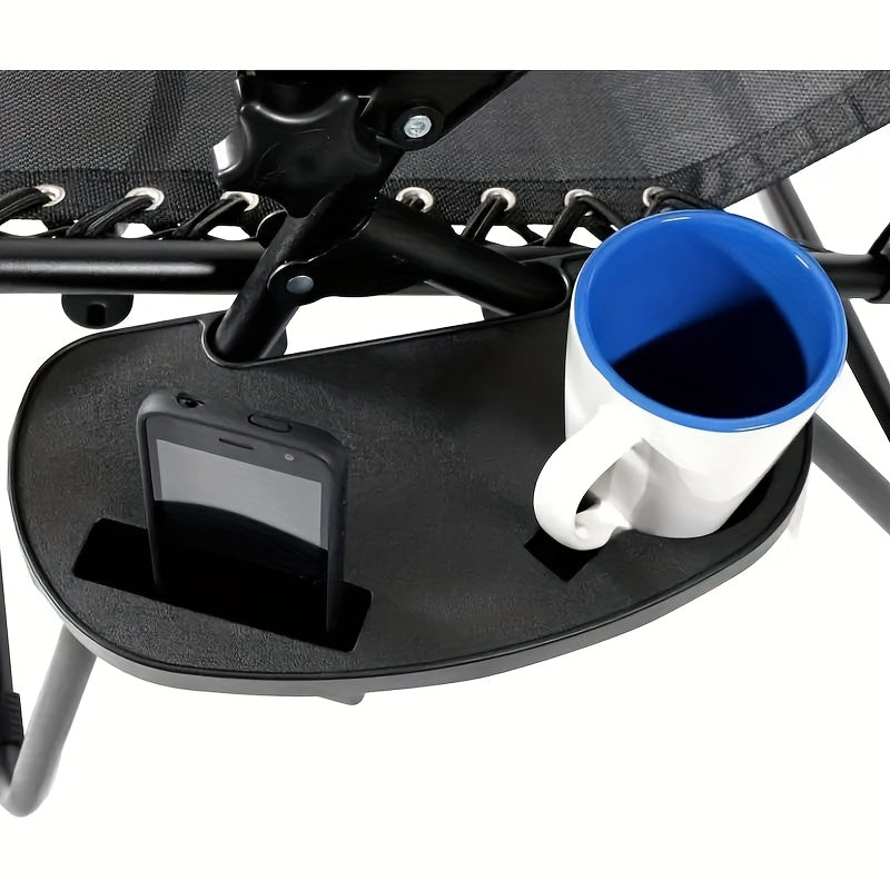 A modern black zero gravity chair accessory tray with cup holder and phone slot. Its durable clip-on design is perfect for lounging and beach recliners, and it is made of sturdy plastic.