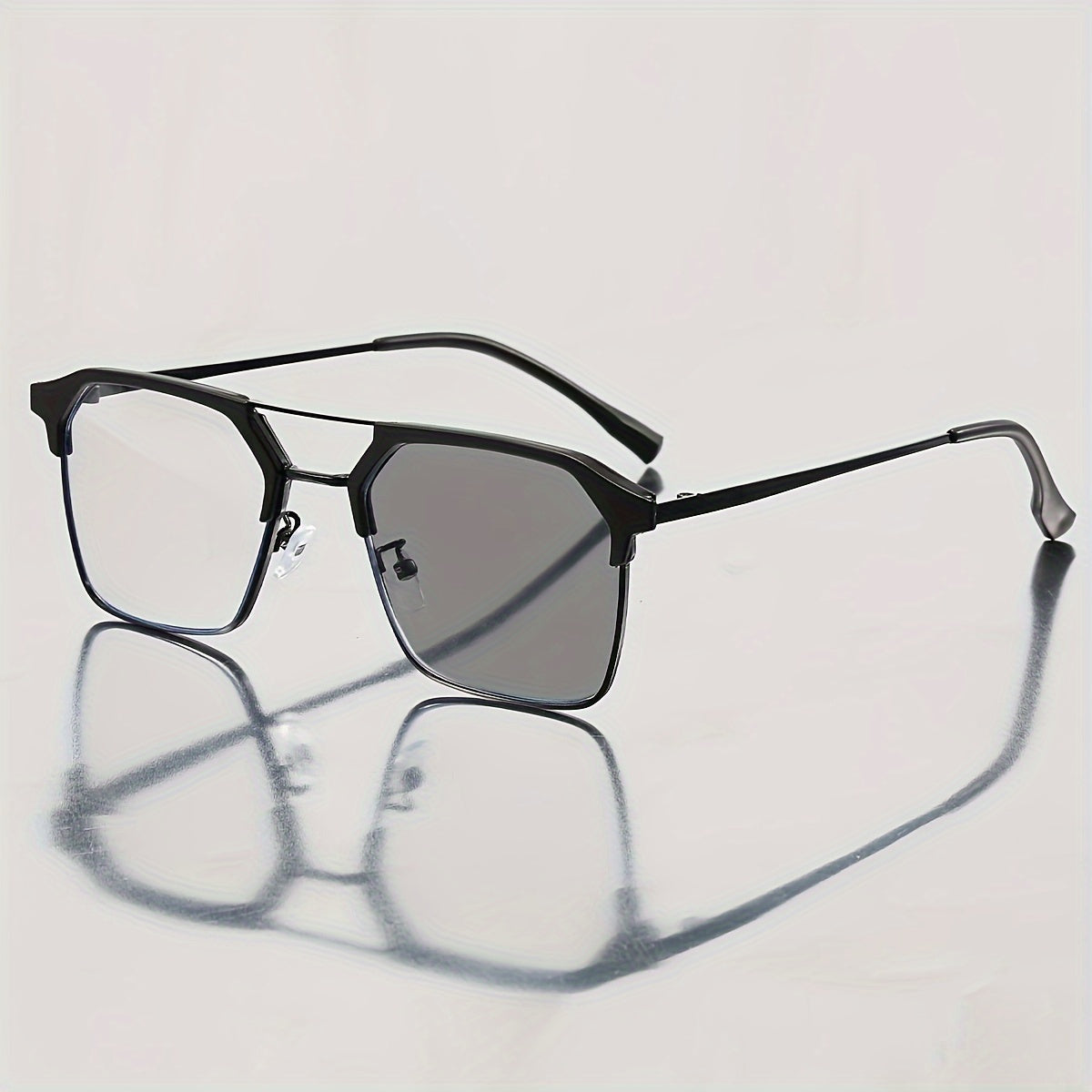 Unisex photochromic glasses with iron alloy frame and AC lens for travel, mobile, and computer use.