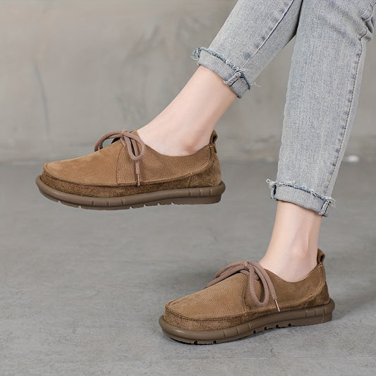 Solid color flat shoes for women with casual lace-up design, suitable for outdoor activities and featuring low-top comfort.