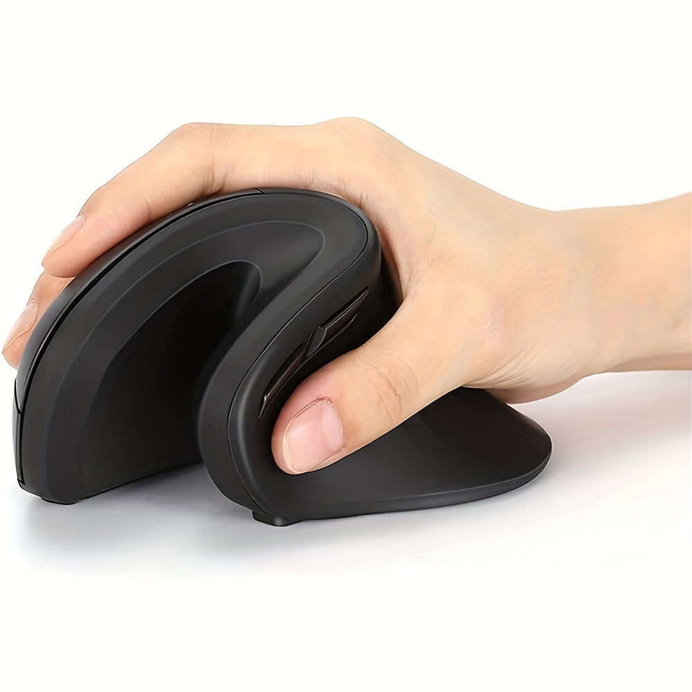 Battery-powered ergonomic wireless mouse designed for gaming and compatible with Windows XP for use with PC or laptop in a home office.