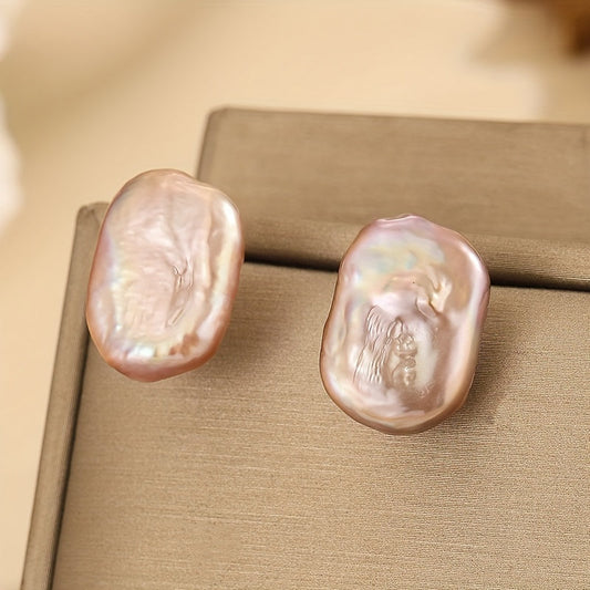 Vintage-style freshwater pearl stud earrings weighing 3.85g, featuring elegant S925 silvery posts. Ideal for casual wear or as a thoughtful gift.