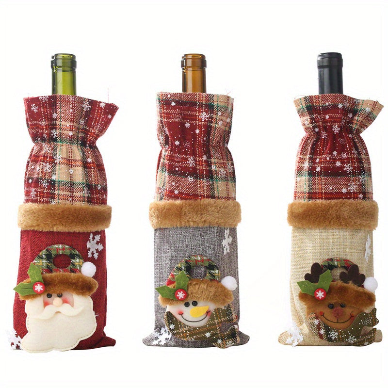 Set of 3 Christmas wine bottle covers in plaid linen with Santa and reindeer design. Hand washable canvas bags for holiday décor and accessories.