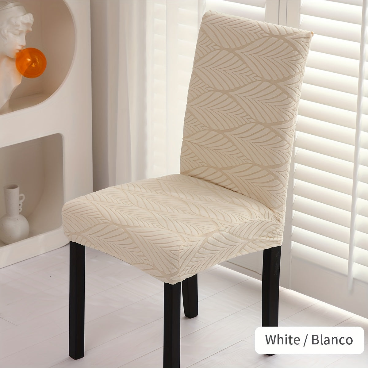 Elastic dining chair slipcovers with leaf pattern, removable and stretchable, made of polyester and spandex blend. Machine washable with elastic band closure. Suitable for home, office, and banquet hall decor.