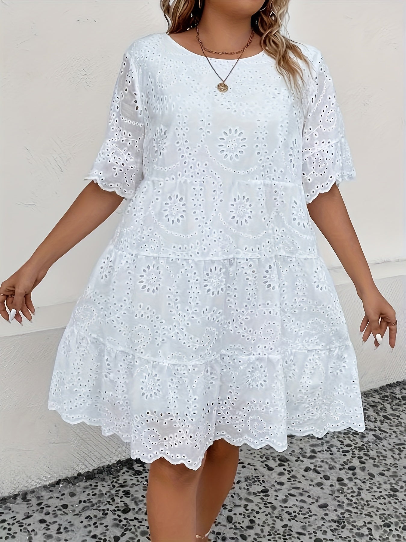 Lace-trimmed plus size dress with eyelet embroidery, round neck, short sleeves, and mesh fabric, ideal for spring and summer.