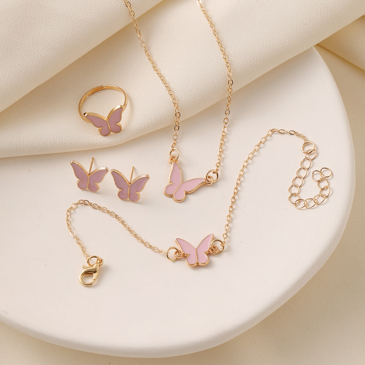 4-piece Elegant Butterfly Jewelry Set for Women, includes necklace, ring, earrings, and bracelet. Versatile fashion accessories for all occasions, perfect for gifting.