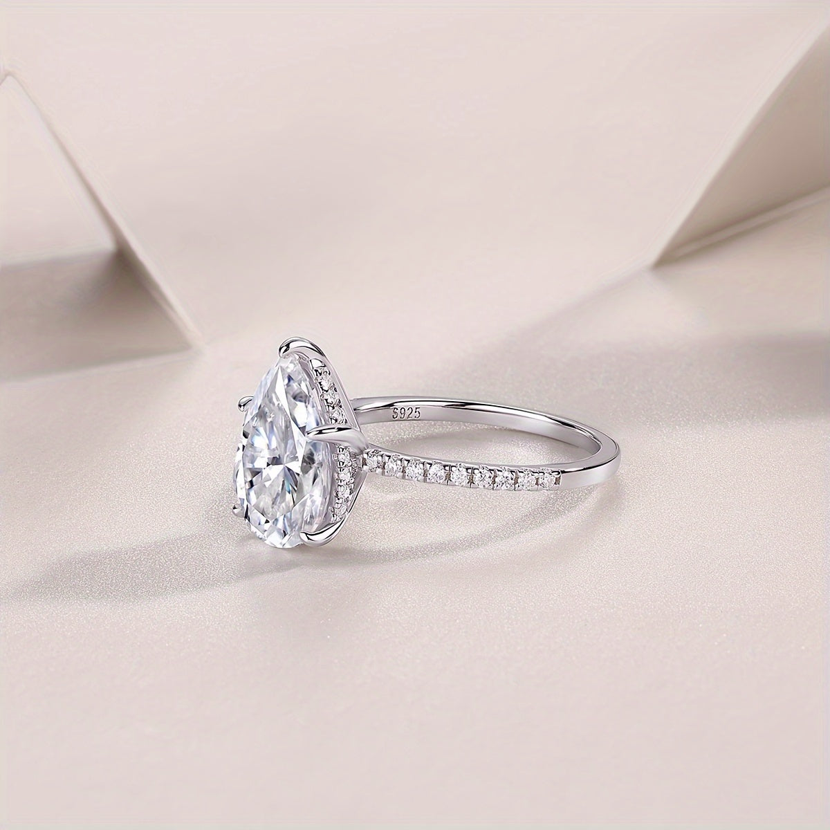 Elegantly designed JIU ZUAN Moissanite Engagement Ring, crafted from high-quality 925 Sterling Silver with a luxurious 18K Golden Plated finish, suitable for both Men and Women. Comes with a lovely gift box making it perfect for any occasion - whether