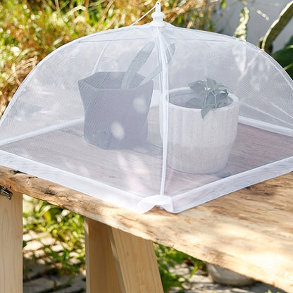 1 white rice cover that doubles as a foldable dining table food cover and household dust cover, suitable for keeping flies away while dining outdoors.