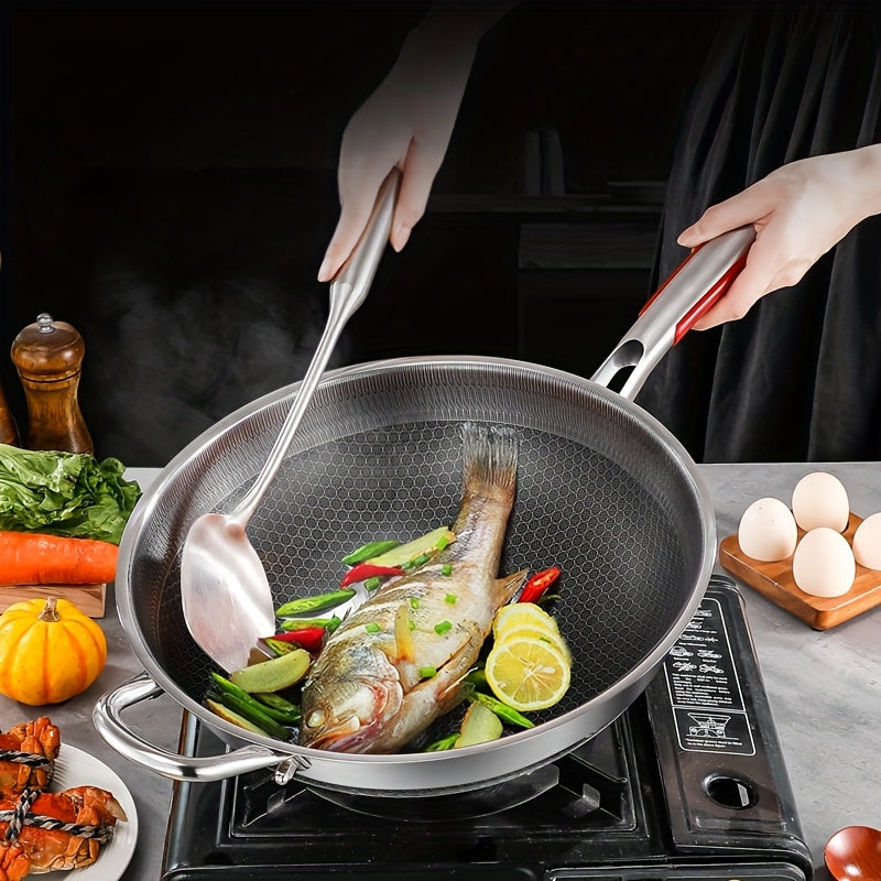 Stainless steel frying pan perfect for outdoor camping and use on gas stove or induction cooker. This non-stick pan is ideal for frying steak, eggs, and fish. The kitchen honeycomb design ensures even cooking. Available in 32cm, 34cm, and 36cm sizes with