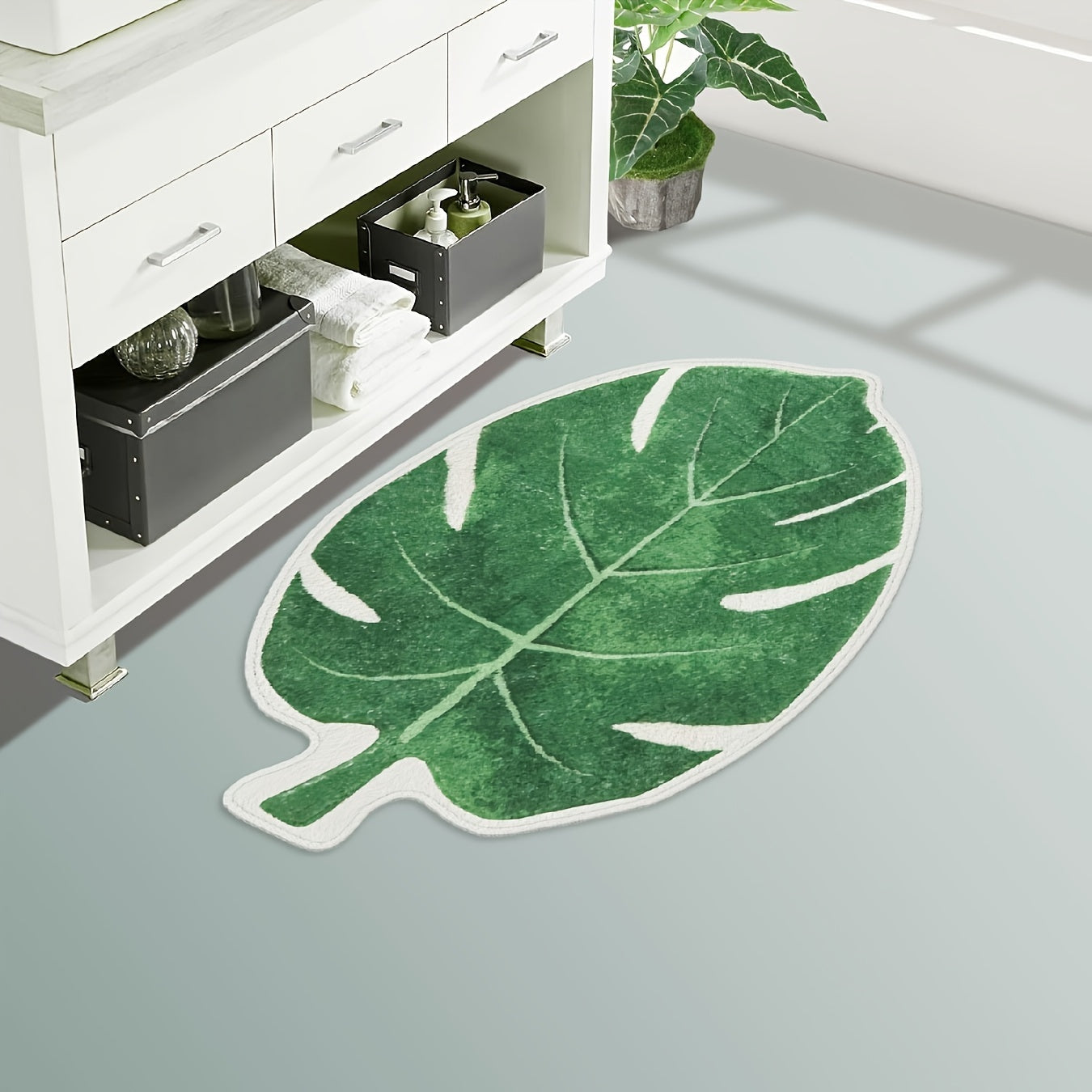 Soft and plush floor mat with a green leaf design, non-slip and highly absorbent, ideal for bathroom, kitchen, entryway, bedroom, and living room.