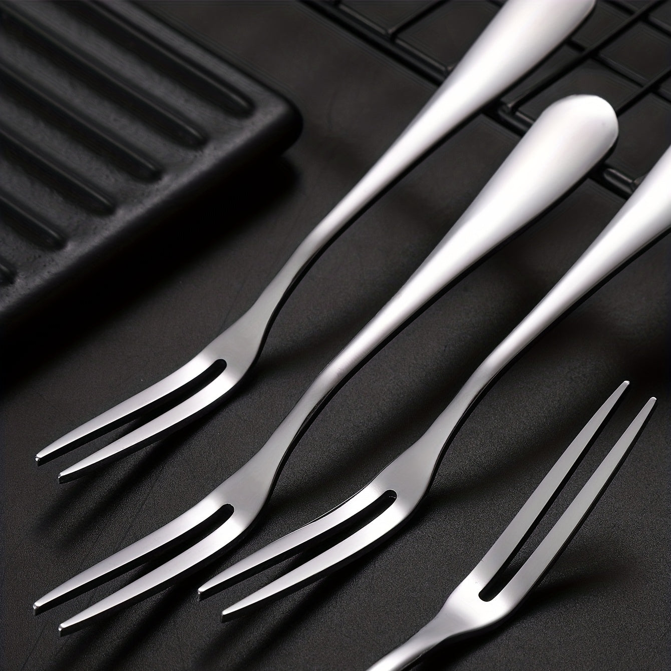 10 stainless steel fruit forks for multiple kitchen uses.