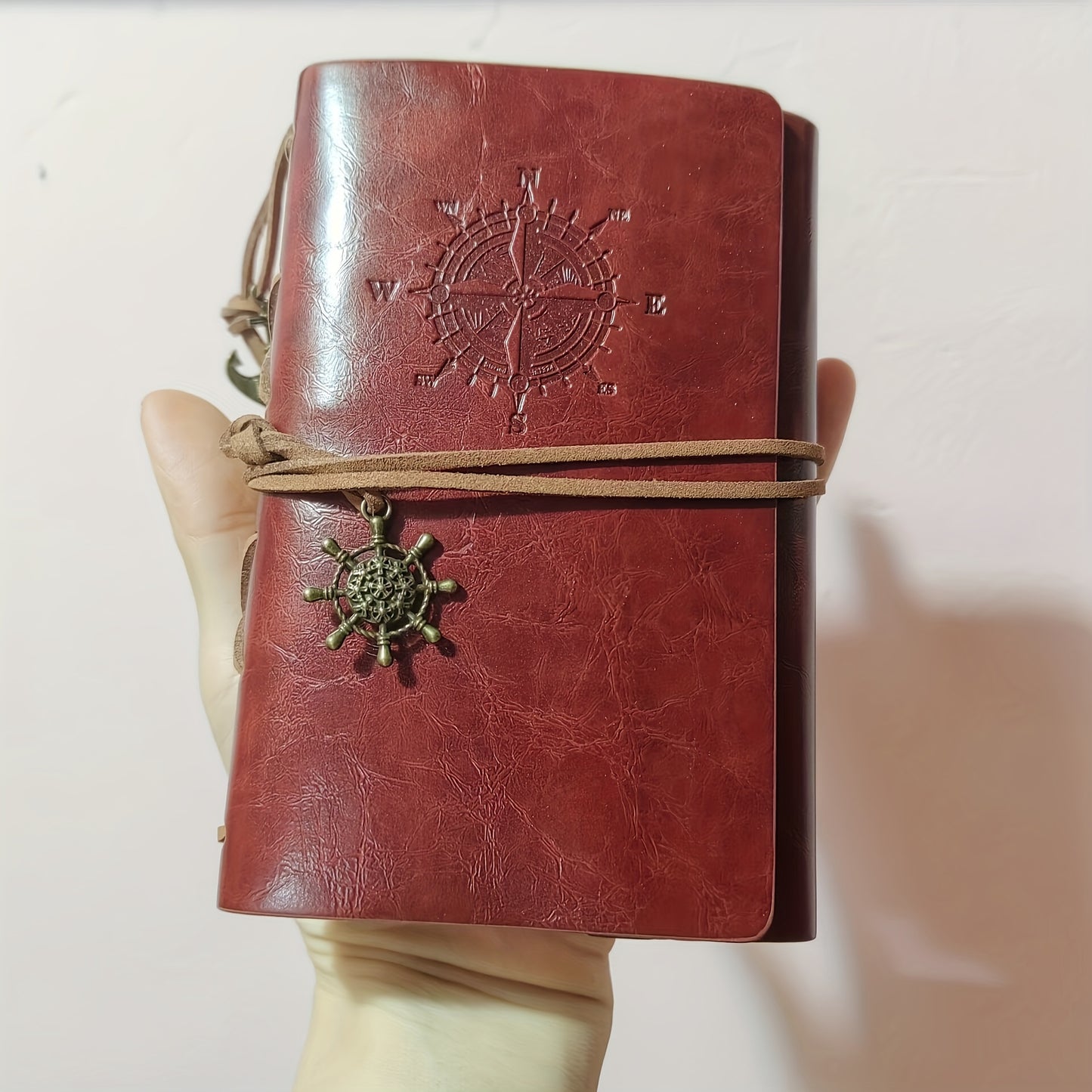 Old-fashioned diary with matte finish, plain ruling, spiral ring binding, pirate design, and retro style.