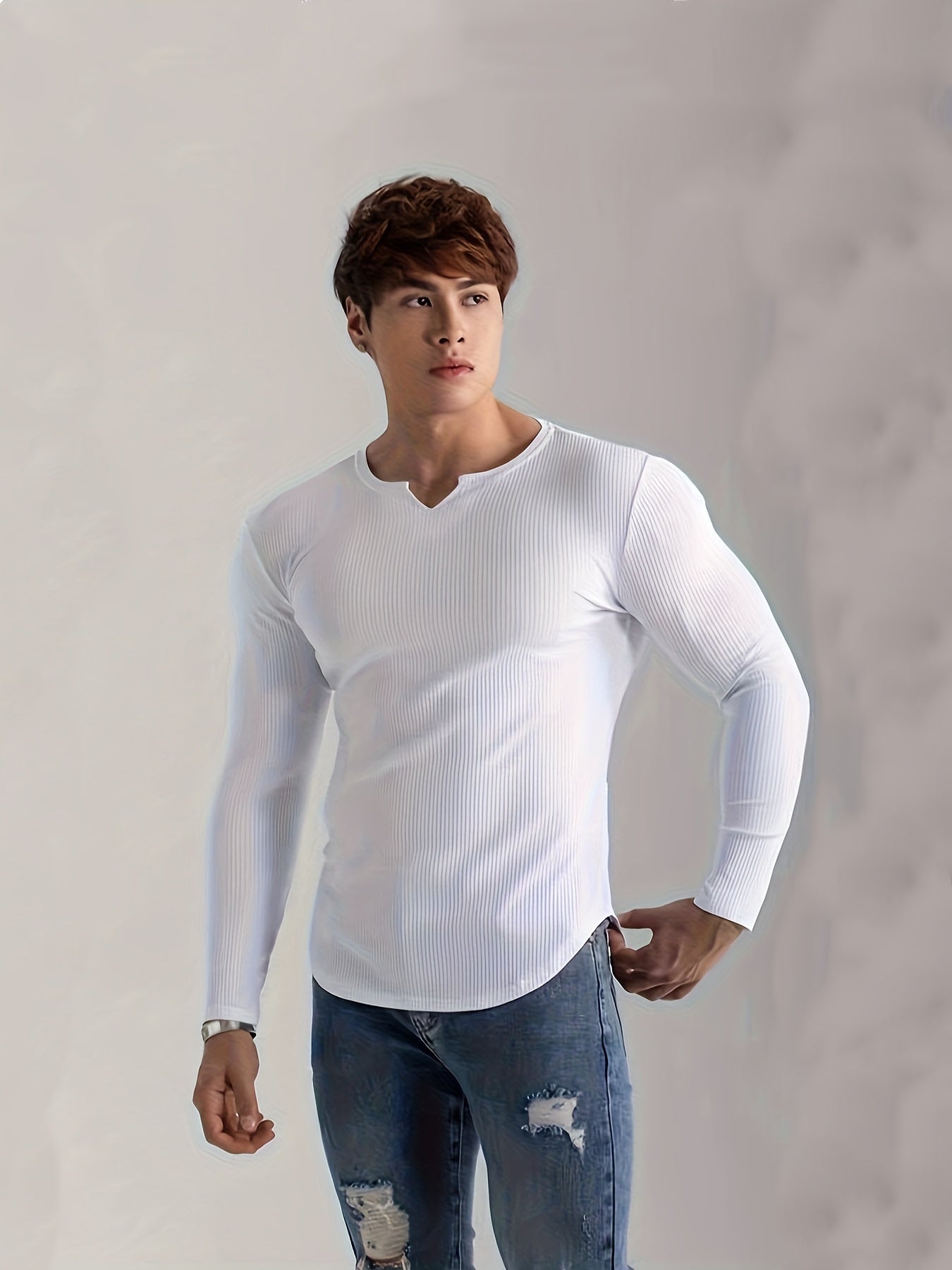 Men's solid color long sleeve V-neck t-shirt for comfortable and casual wear in spring and fall outdoor activities.