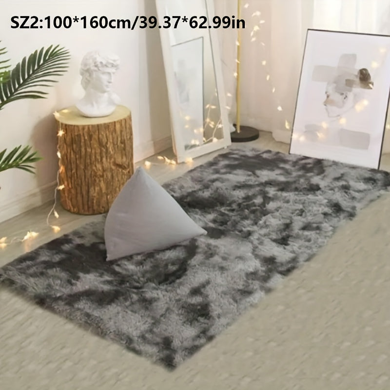 Long fleece carpet in a dark grey tie dye gradient, perfect for the living room coffee table or bedroom decor. This washable mat is fully padded and makes a great Halloween or Christmas gift.