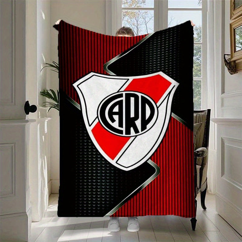 Stay cozy with a River Plate inspired printed fleece blanket. This soft and warm blanket is perfect for sofas, beds, and camping trips. It is machine washable and suitable for all seasons, making it a versatile gift for home and travel.