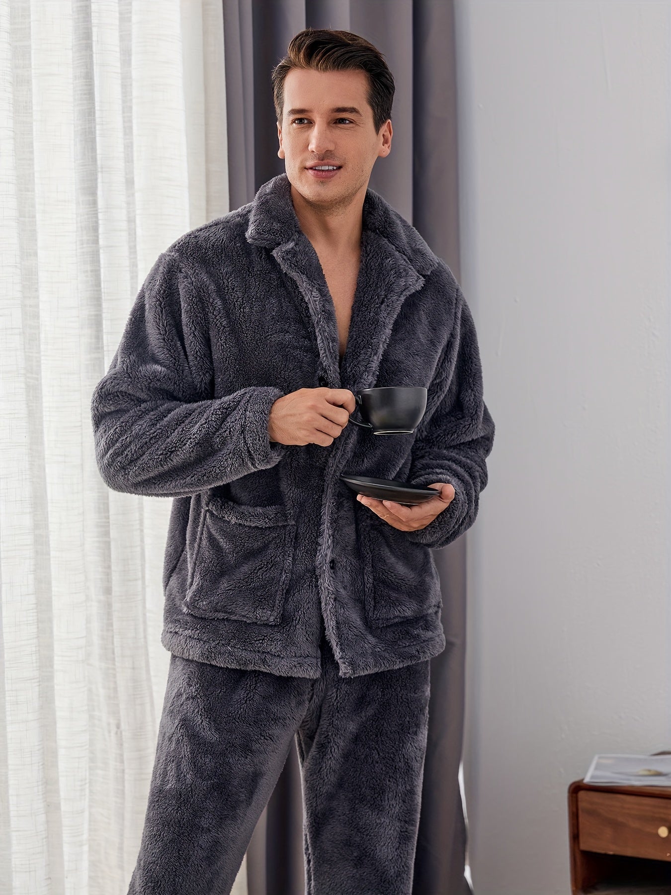 Warm and cozy men's fleece pajama set with pockets, perfect for winter. Features long sleeve top and pants. Machine washable.