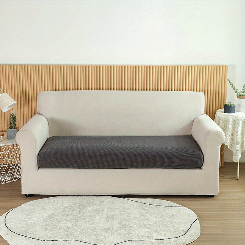 Waterproof Jacquard Sofa Slipcover protects furniture with elastic cover. Polyester material enhances home decor.