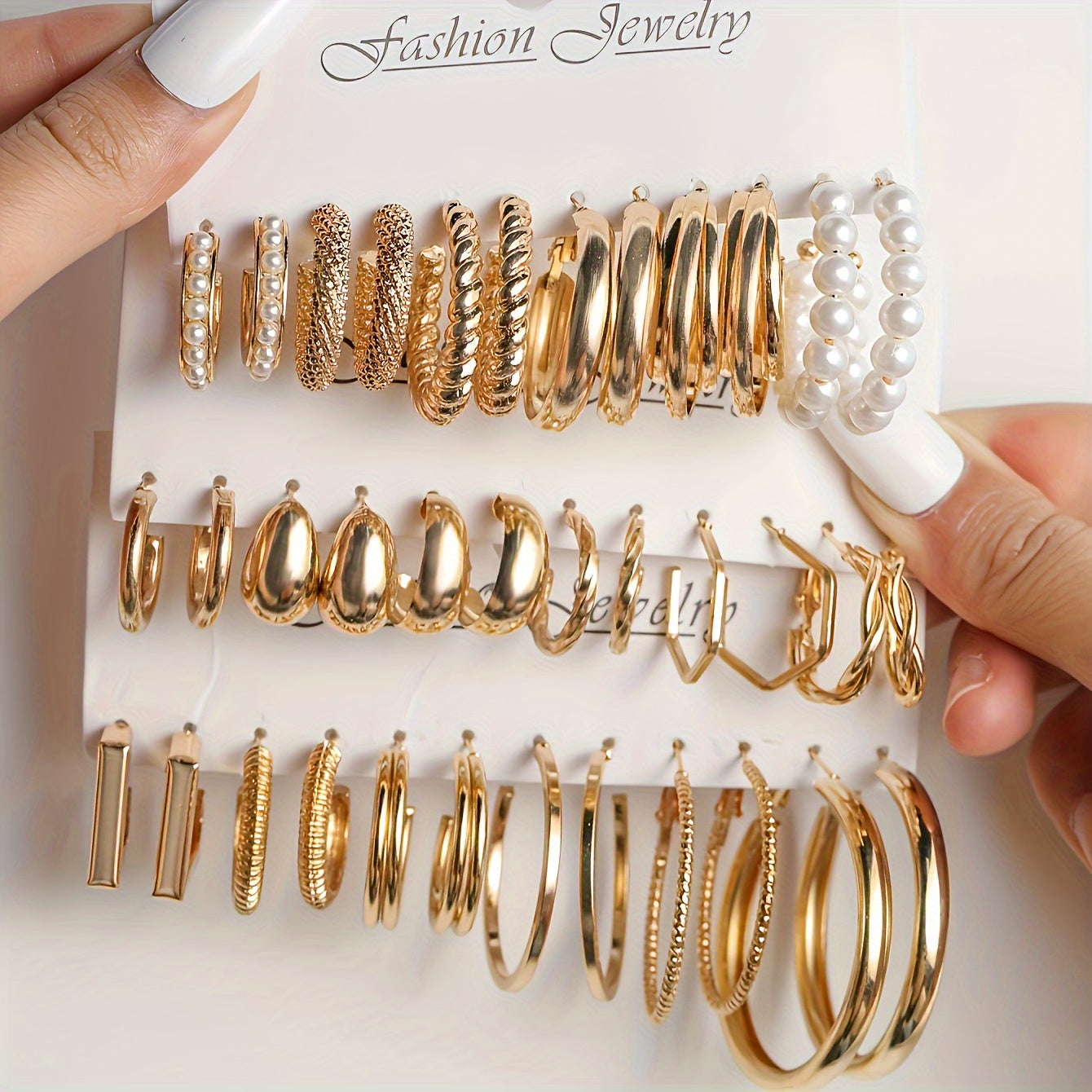 Set of 36 fashion alloy rings and earrings for women, featuring a retro punk style with artificial pearls, perfect for everyday wear.