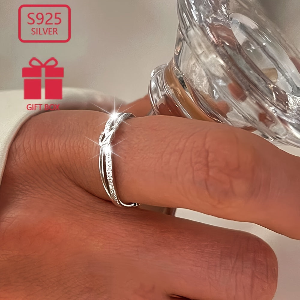 Women's adjustable sterling silver ring with starry knot rope design. Simple and frosted with a hollow plain opening. Hypoallergenic and lightweight, weighing approximately 1.2g.