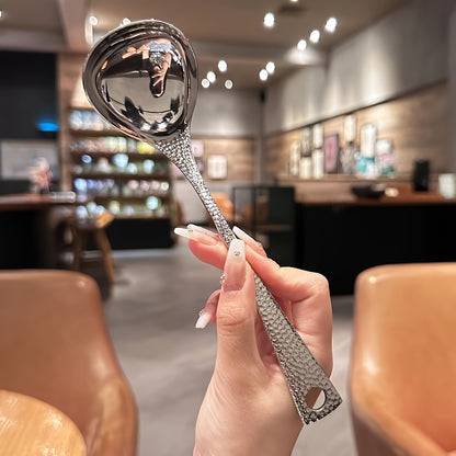 Sleek stainless steel long-handled spoon with leak-proof design, ideal for home and restaurant use.