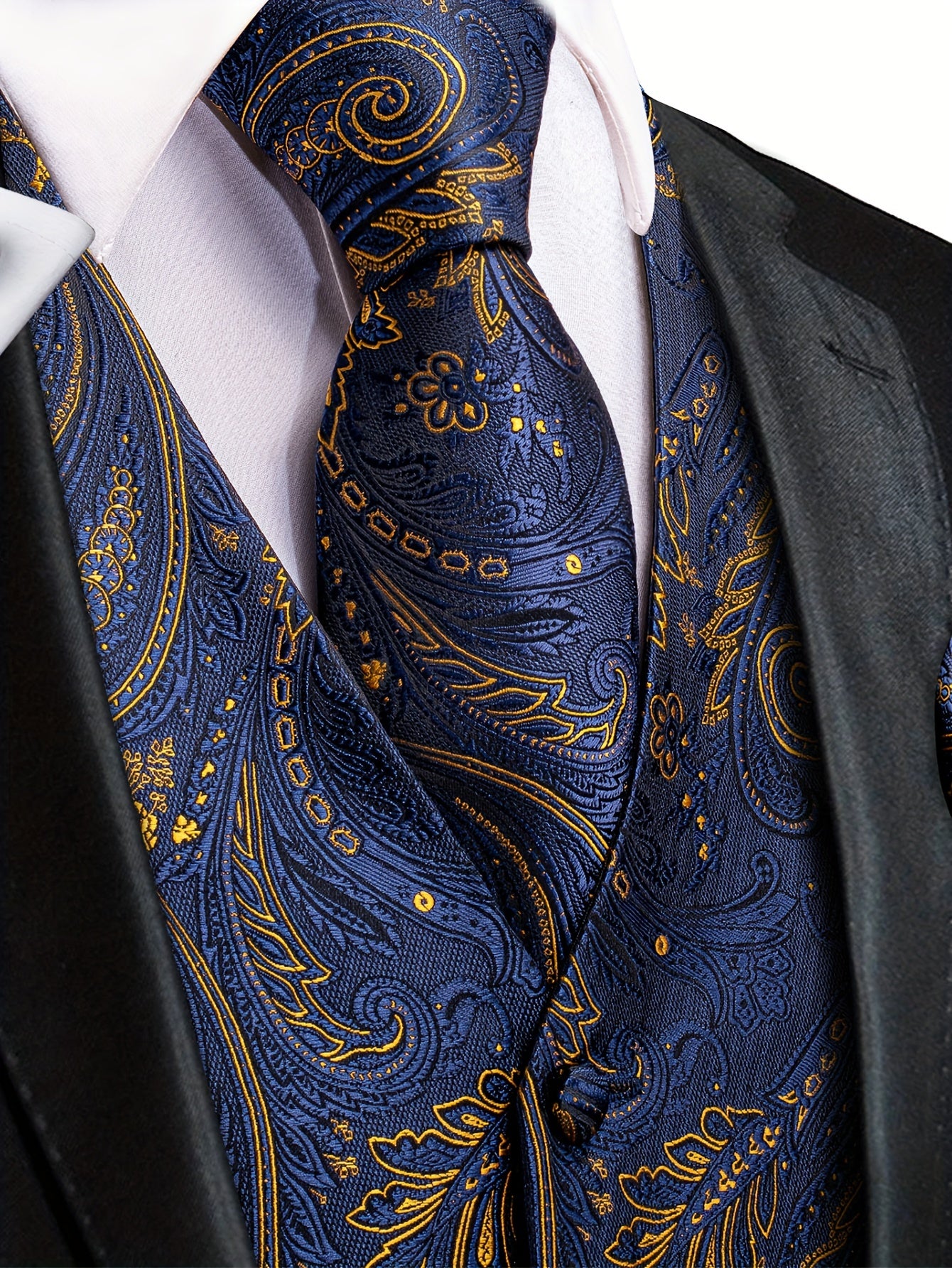 White paisley pattern accessories for big men: waistcoat, necktie, hanky, and cufflinks