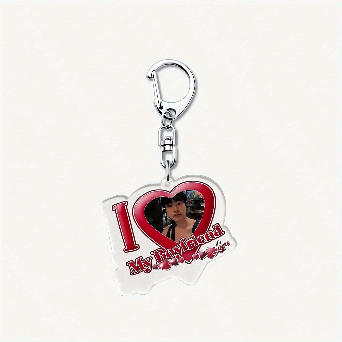 Customize your keys with a unique touch using our personalized acrylic heart keychain. Featuring a UV printed portrait and alphabet theme, this keychain is the perfect Valentine's Day gift for your significant other. With a lobster clasp for easy