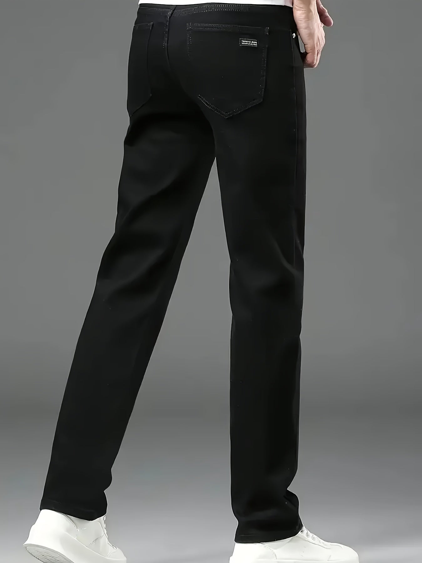 Stretchy straight-leg black jeans for plus-size men, suitable for all seasons, versatile and comfortable for business