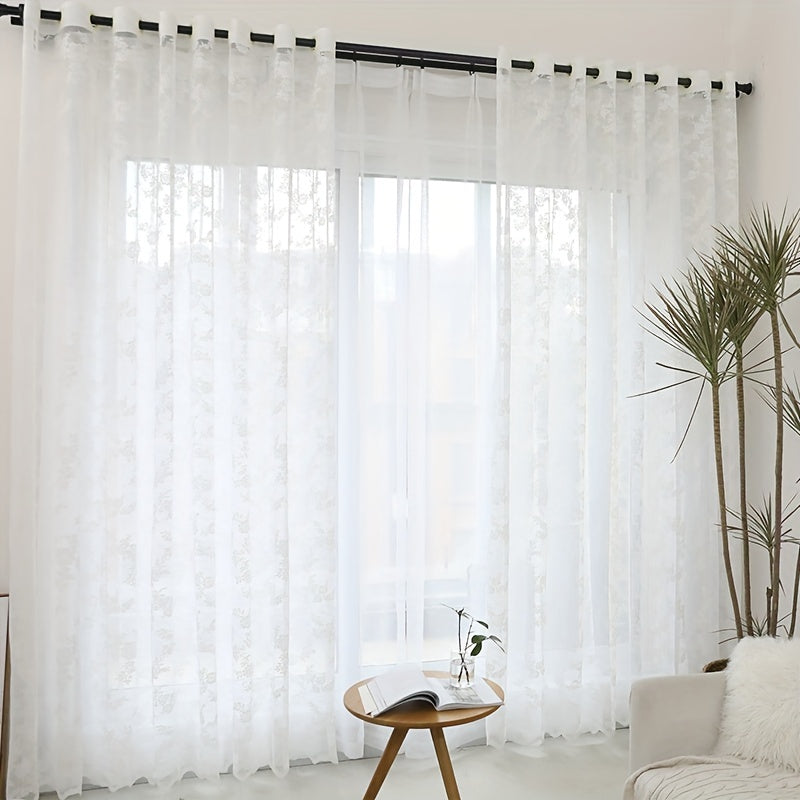 Elevate your living space with the sophisticated charm of the Elegant French White Lace Sheer Curtain featuring a delicate floral pattern. Made from semi-transparent polyester, this curtain is ideal for adding a touch of elegance and privacy to your