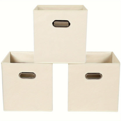 6 pieces of foldable fabric storage bins with handles are available in classic cube designs for organizing your home, bedroom, or office. Choose from black, blue, or cream options.