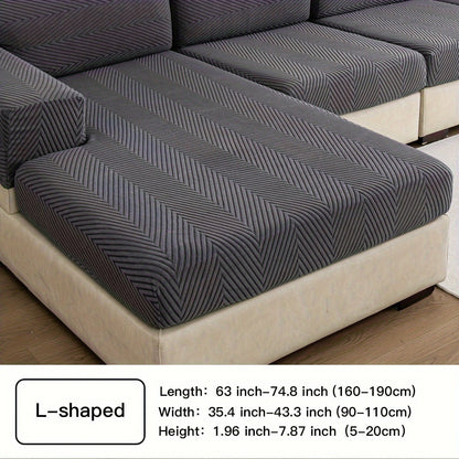 Waterproof sofa cover with elastic stretch and jacquard argyle pattern for home or office decor.