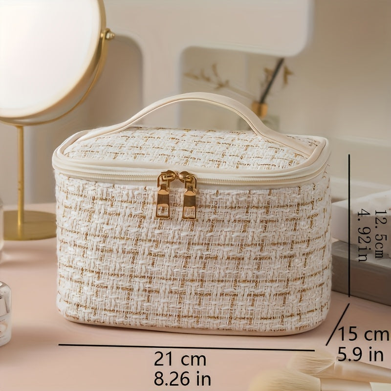 Stylish waterproof cosmetic bag with zipper, cute white design, made of durable polyester, perfect for travel.