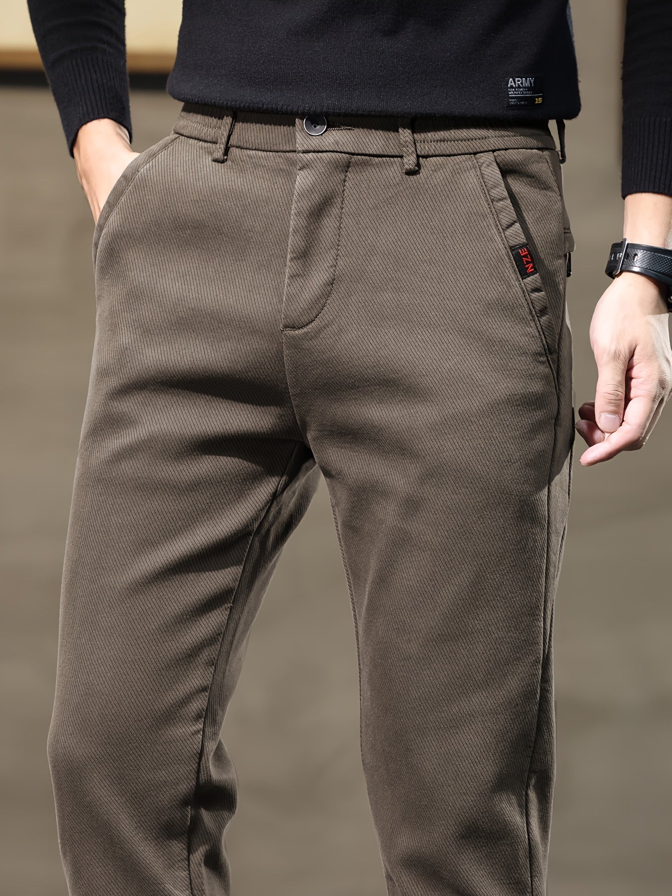 New men's casual pants by a sports brand, perfect for spring and autumn 2023.