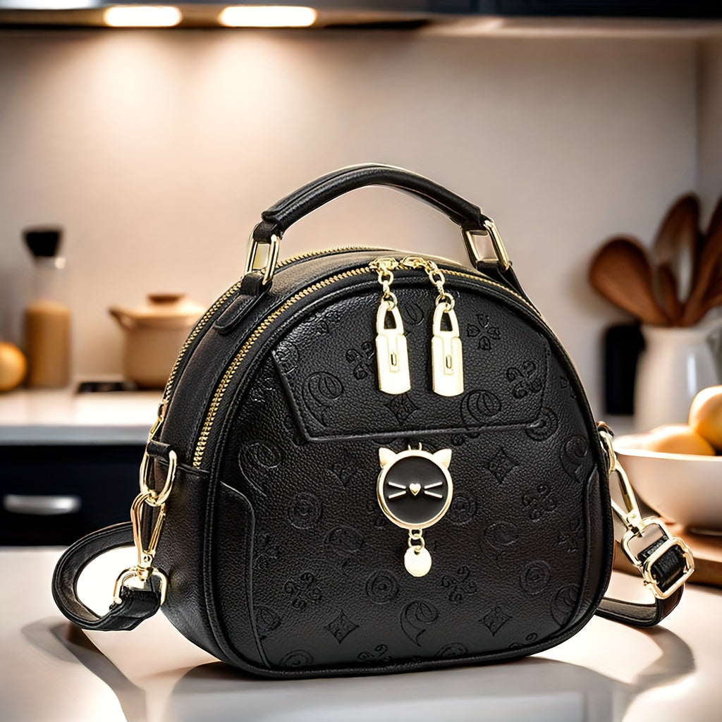 Trendy black round crossbody bag with adjustable strap, golden-tone hardware, "LOVE" design, zipper closure. Ideal for casual outings and commuting.