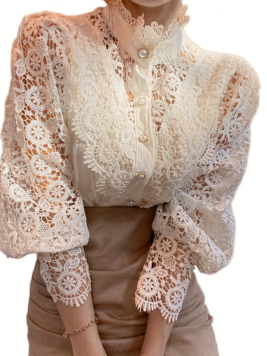 Victorian lace blouse with pearl buttons and intricate floral patterns, suitable for casual or semi-formal events.