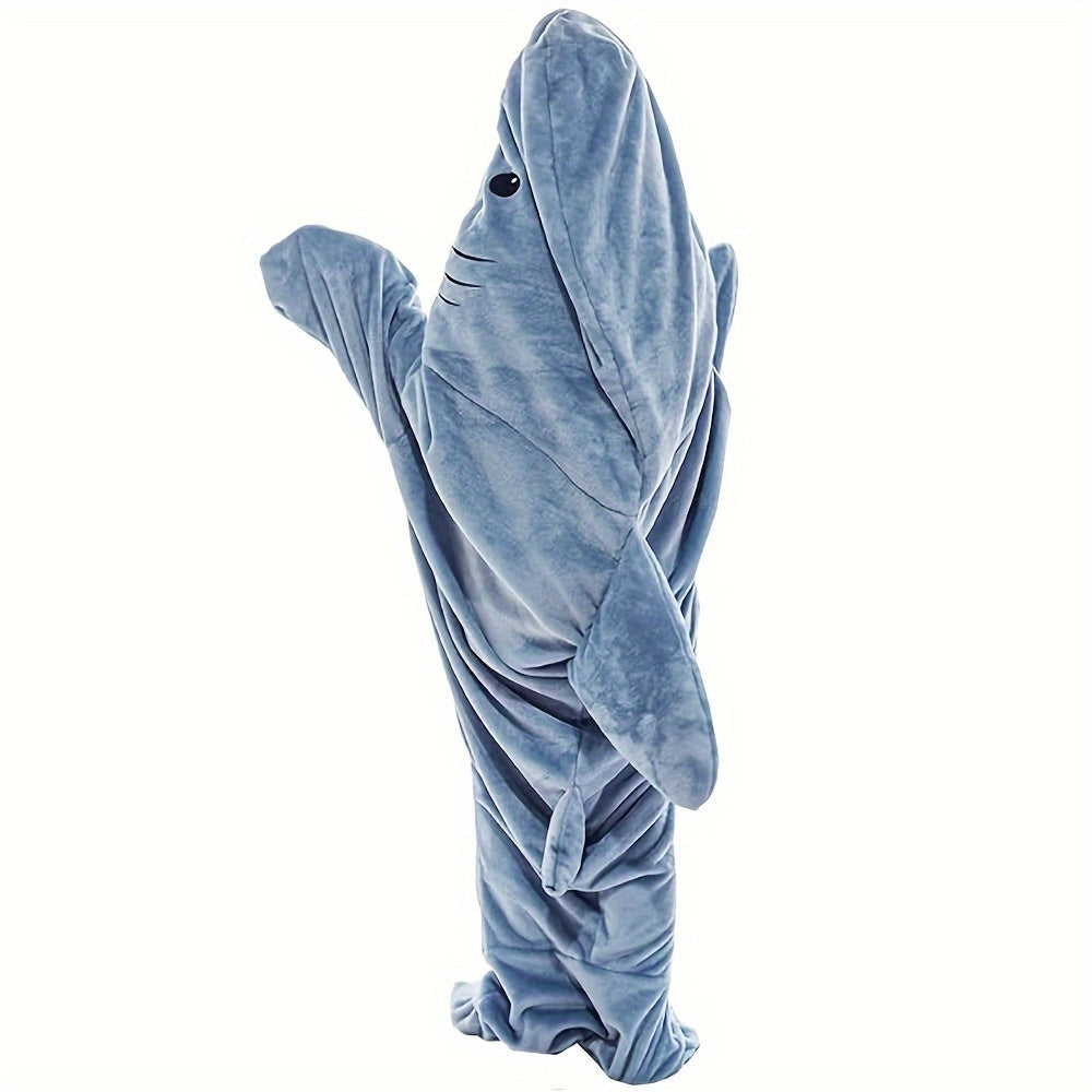 Stay warm and cozy with the 1pc SOWOIOM Cozy Shark Wearable Blanket. Made from soft flannel and featuring a stain-resistant blue with a white shark design, this blanket is perfect for boys and girls. It is machine washable and can be used as a sleeping