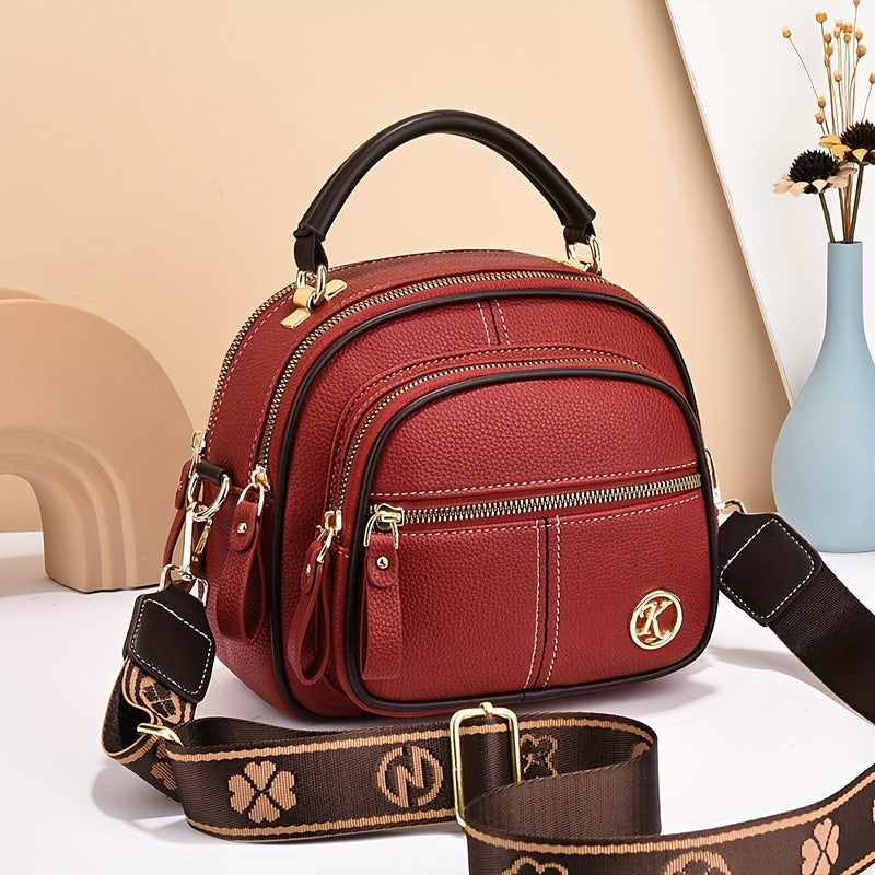 Versatile small handbag with multiple pockets and adjustable strap for women's fashion.