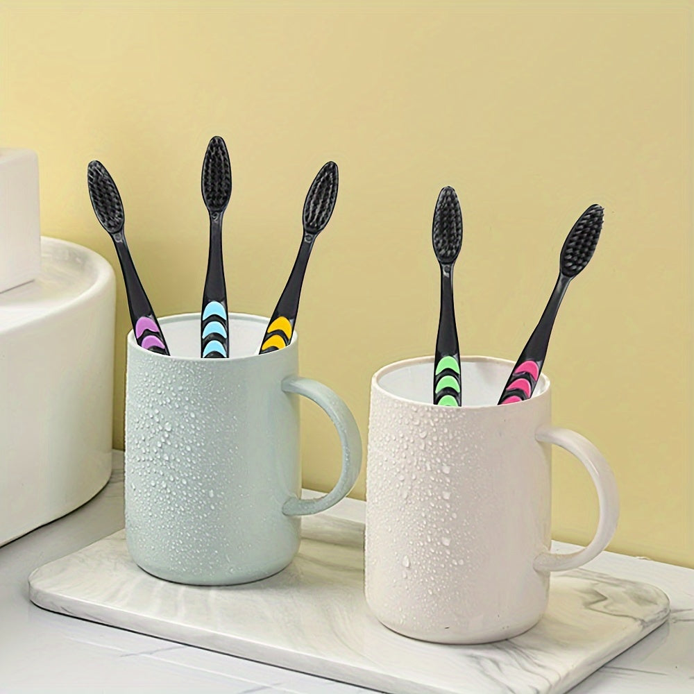 5/10 soft bristle toothbrushes with multicolor grip handles and black nylon bristles for adults, ideal for deep manual oral care.